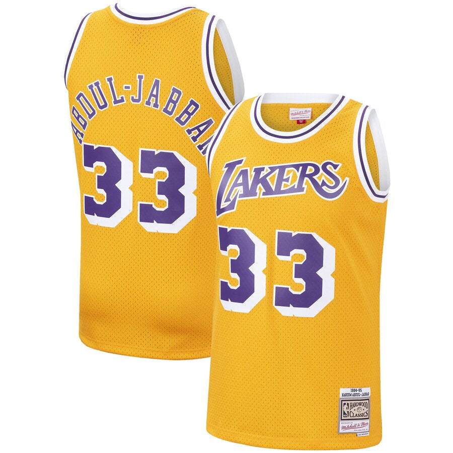 Men's Los Angeles Lakers Kareem Abdul-Jabbar Mitchell & Ness Gold 1984-85 Hardwood Classics Swingman Jersey - image 1